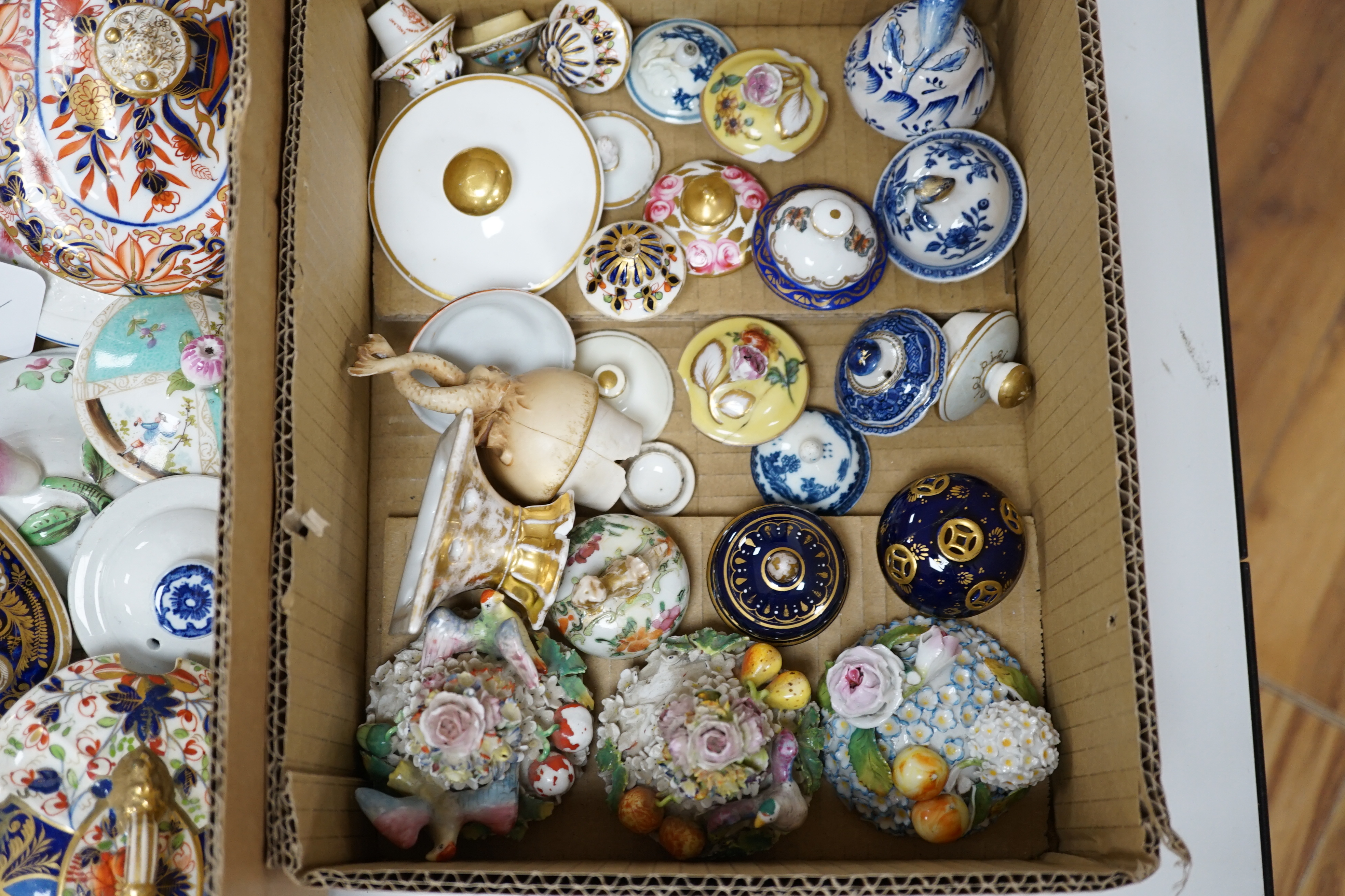 A large collection of 18th and 19th century tea and coffee pot covers